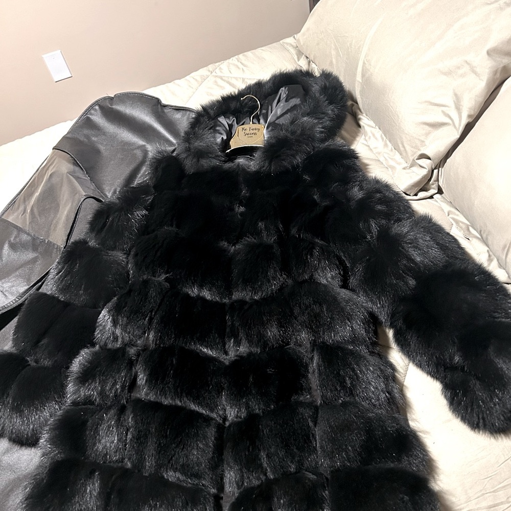 3/4 Brand new Fur parka never worn removable sleeves to wear as a vest
